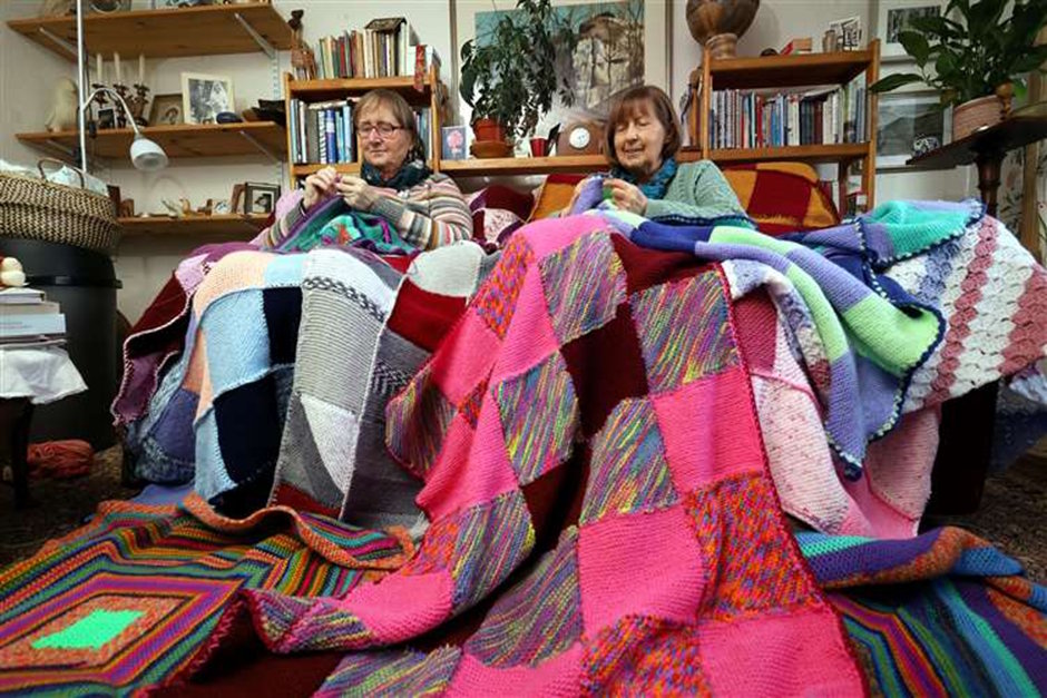 Caroline Gage and Anna Blakie, members of 'The Knitting and Crocheting Group for Refugees'. Picture: James Mackenzie.