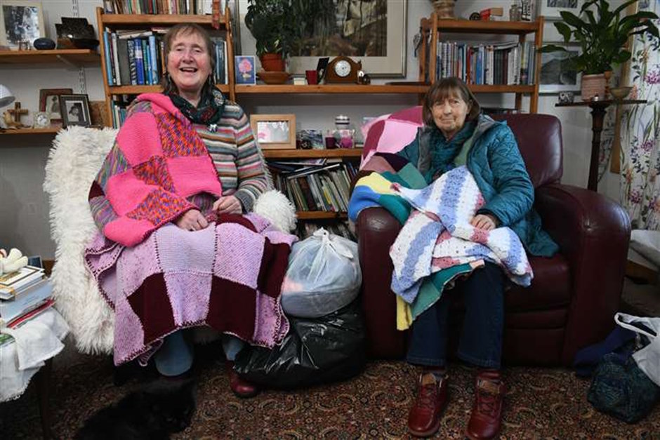 Caroline Gage and Anna Blakie, members of 'The Knitting and Crocheting Group for Refugees'. Picture: James Mackenzie.